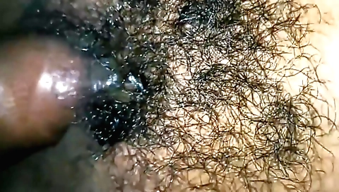 Indian girl plays a girl with her hairy pussy and makes it horny