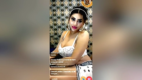 Sexy brunette with sexy big boobs in a solo web cam video