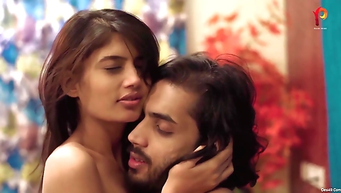 Brunette in red stockings trying on a new hairstyle