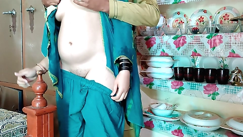 Wife with nice round body and large breasts is in the bedroom