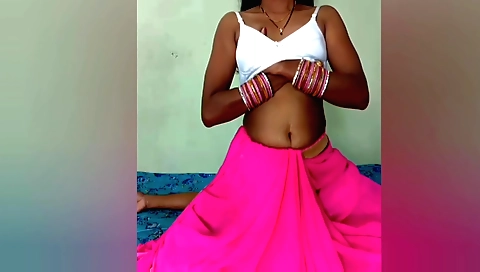 Indian teacher and her student are in a room playing