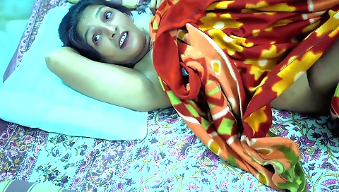 Indian brunette with big tits fucks in the bedroom