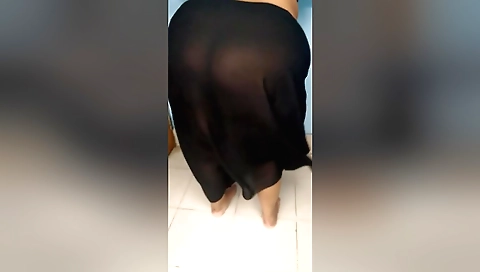 Busty indian babe in white bikini shows off her ass