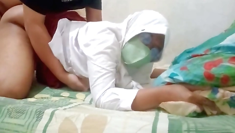 Indian babe gets ready on a couch to play with hair