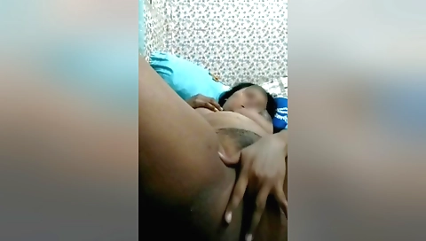 Hot brunette masturbates her own body in solo clip