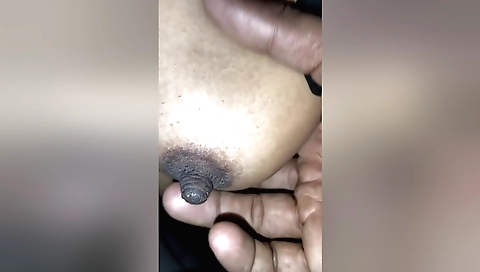 Indian couple is playing with their cocks on a chair