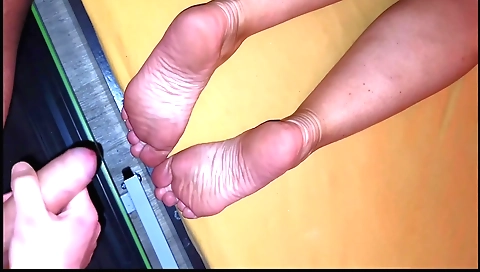 I'm playing with my stepmother's feet in homemade fetish video