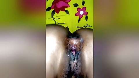 Hairy indian chick is getting fucked on top of a dick