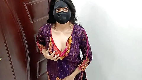 Busty college girl in a long black dress is alone in her room