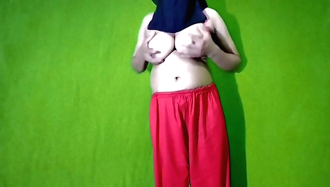 Bengali desi woman in a red dress shows off a pair of tits