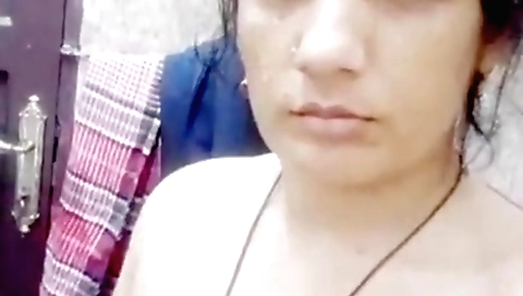 Naked brunette naked in her home bedroom in amateur video