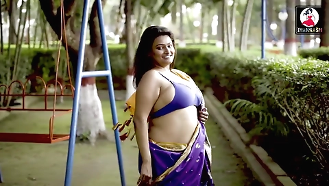 Horny brunette milf in sexy clothes is in poses in the bed