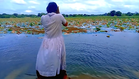 Girl plays with a dildo in the outdoor in her bikini