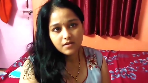 Indian brunette with a big ass is licking her pussy