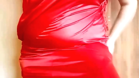 Busty chick in a sexy black dress and shorts on webcam