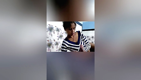 Hairy brunette girl is making a collage video of herself