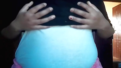 Busty indian hottie is shaking her boobs in her yoga pants